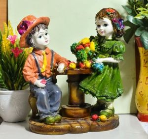 Polyresin Multicolor Fruit Table Baby Couple Statue