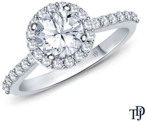 A Beautiful Halo Diamond Engagement Ring With Center Diamond