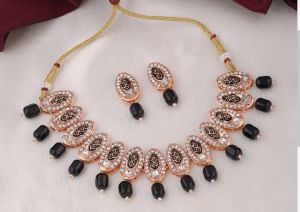 Traditional white and green stone neck set