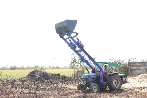 Powertrac Tractor fitted Telescopic Husk Loader
