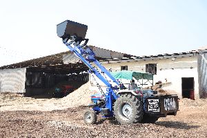 Powertrac Tractor fitted Telescopic Husk Loader