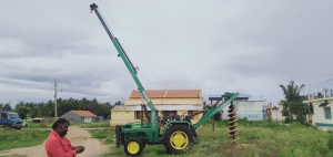 John Deere Fitted Pole Erection Machine