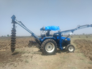 New Holland Tractor Fitted Pole Erection and Post Hole Digger
