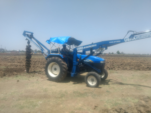 New Holland Tractor Fitted Pole Erection and Post Hole Digger