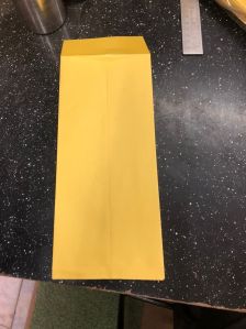 yellow paper envelope