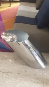 Decorative side table in stainless steel