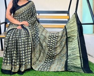 ajrakh modal golden zari saree