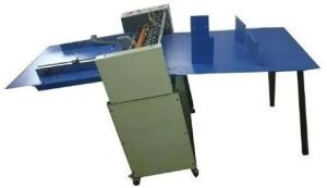 Paper perforating machine