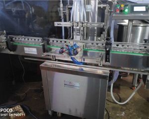 Automatic Volumetric Liquid Bottle Filling Machine