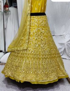 Embroidered Yellow Net Lehenga Choli
