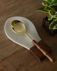 Spoon shaped platter with wooden handle