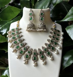 Brass Kundan Set With Green Stones