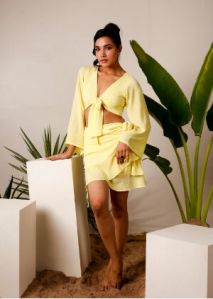 Deep V-neck yellow tie knot crop top with sarong skirt set