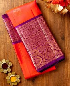 Reddish Pink Kanjivaram Saree With Big Purple Zari Border