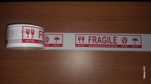 HANDLE WITH CARE PRINTED TAPE IN 48MM X 65MTR