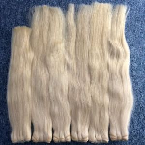 RAW WAVY BLONDE WEFT HAIR EXTENSIONS..