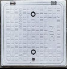 White manhole cover