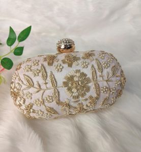 Laides Floral Creeper Oval Clutch Bag