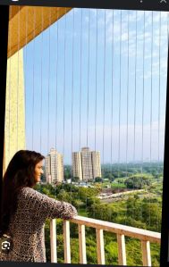 Invisible grill for balconys and window safety