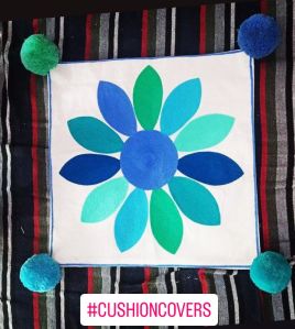 Teal embroidered flower petals cushion cover