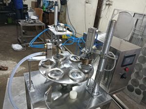 Automatic Cup Filling and Sealing Machine