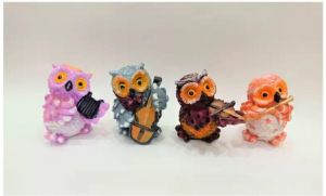 Four Musical Owl Statue Set