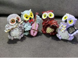 Four Musical Owl Statue Set