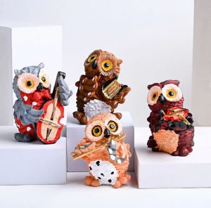 Four Musical Owl Statue Set