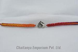 Vibrant Heart Shape Peacock Design Intricate Silver Rakhi