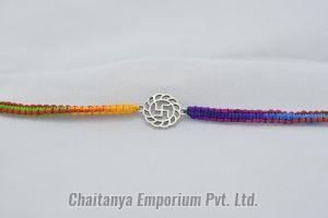 Intricate Swastik Design Silver Rakhi