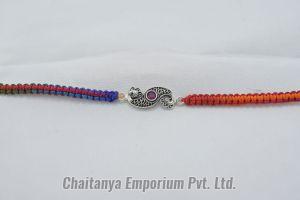 Intricate Peacock Fusion Silver Rakhi