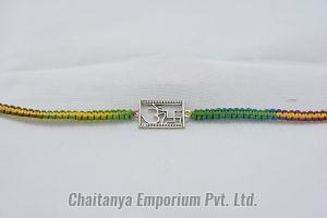 Divine Om and Swastik Silver Rakhi