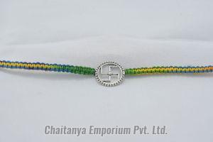Intricate Swastik Ball Fusion Round Shape Silver Rakhi