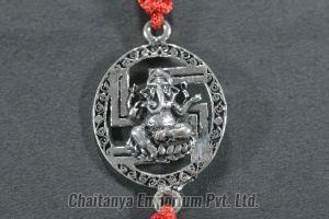 Divine Lord Ganesh On Swastik Silver Rakhi