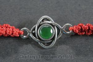 Intricate Cutstone Silver Rakhi