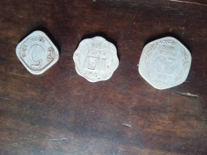 Old coin five ten twenty paise front