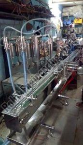 4 Head Volumetric Liquid Filling Machine