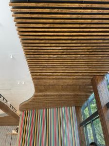 Perforated wooden baffle ceiling