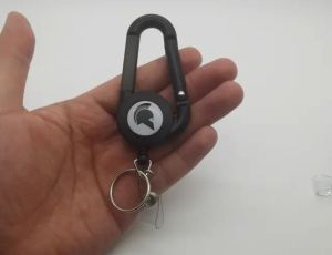 Retractable key id holder