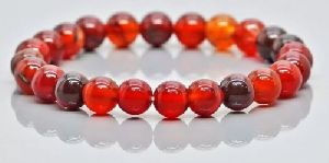 NATURAL RED ONYX SMOOTH ROUND GEMSTONE BEADS STRETCH BRACELET