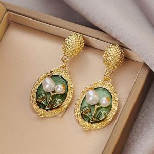 Oval Shape Golden Frame Pearl Drop Earrings