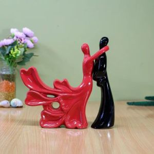 Red and Black Ceramic Couple Statue
