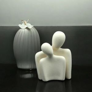 White Ceramic Couple Statue