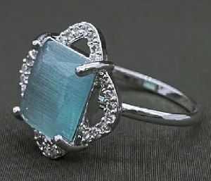 SILVER-PLATED ADJUSTABLE BRASS RING WITH AQUAMARINE STONE