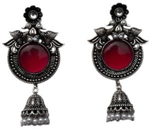 Women Enamelled Oxidised Jhumka Earrings with Maroon Center Stone
