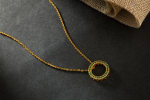 Ladies Circle Cubic Zirconia Gold Plated Pendant With Chain