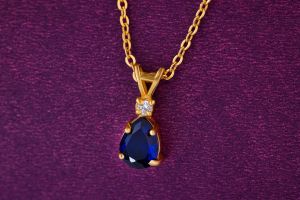ladies ruby teardrop gold plated chain pendant