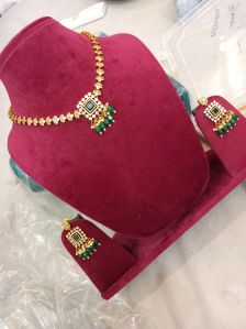 Ladies Emerald Studded Gold Toned Necklace Set
