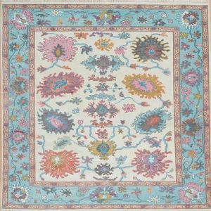 Pastel Floral Bordered Hand Knotted Rug