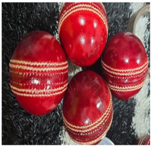 Red and White Leather Cricket Ball